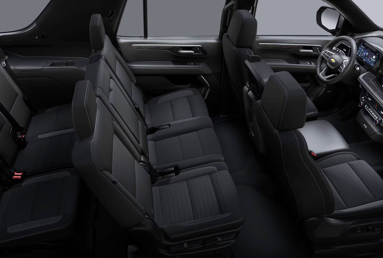 Spacious black SUV interior with three rows of seating