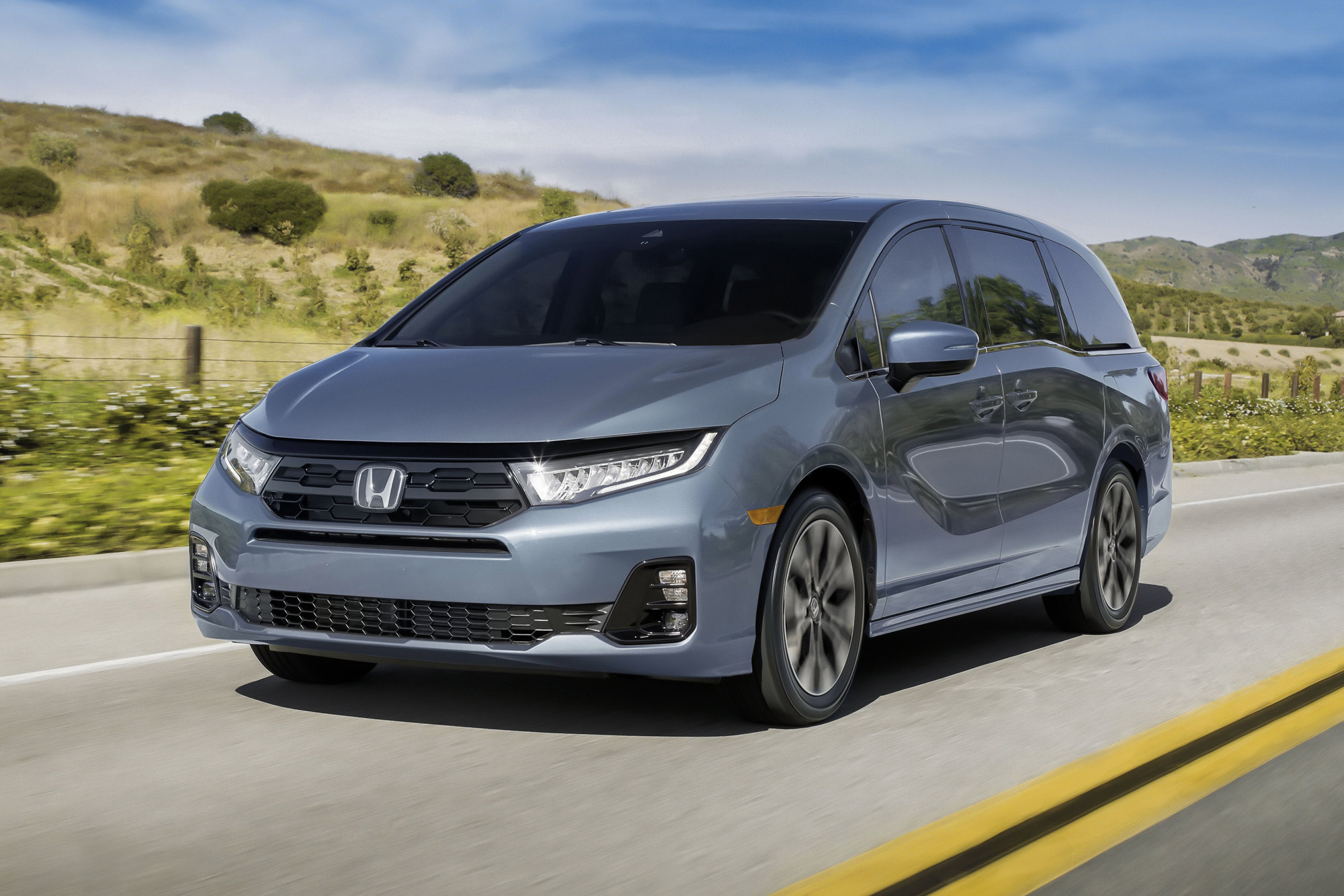 Dark grey 2024 Honda Odyssey minivan — comfortable island transport
